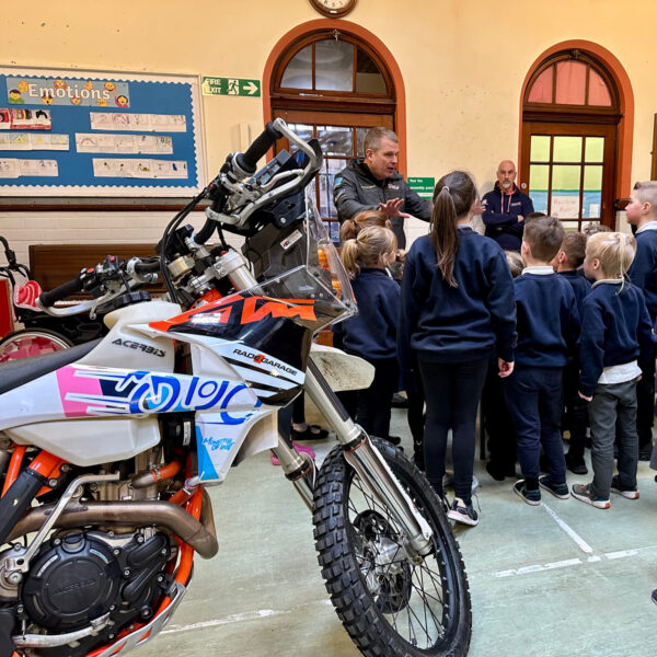 School visit with bike in foreground